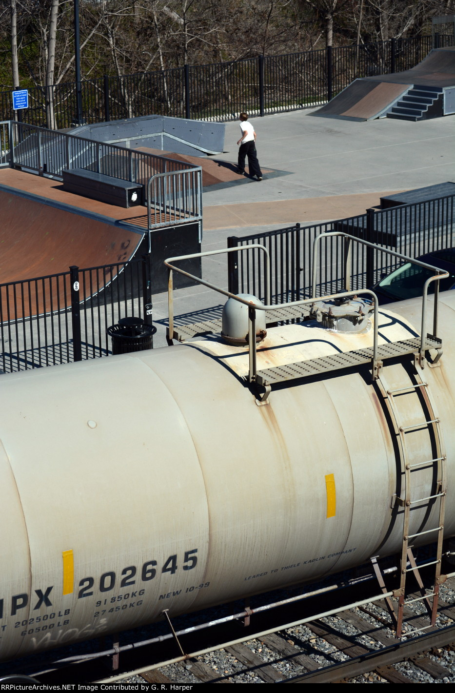 Cut of interchange cars from NS to CSX pauses next to the skateboard park on the riverfront, which once was the site of Lynchburg's Union Station until 1964